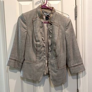This blazer/jacket can dress up a pair of jeans and add to your work wardrobe.